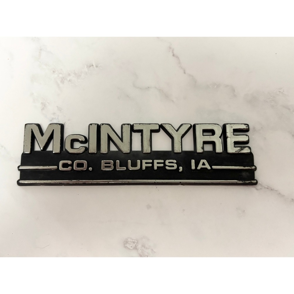 Vintage McIntyre Co Bluffs IA Metal Car Dealer Emblem Council Bluffs Iowa Sign